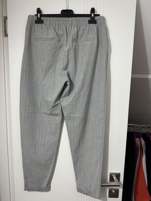 Pantaloni eleganti cu dungi