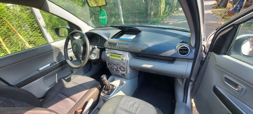 Mazda 2 на части