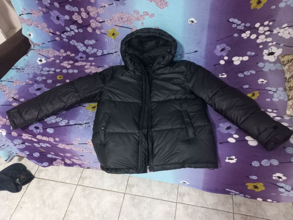 Продам пуховик новый