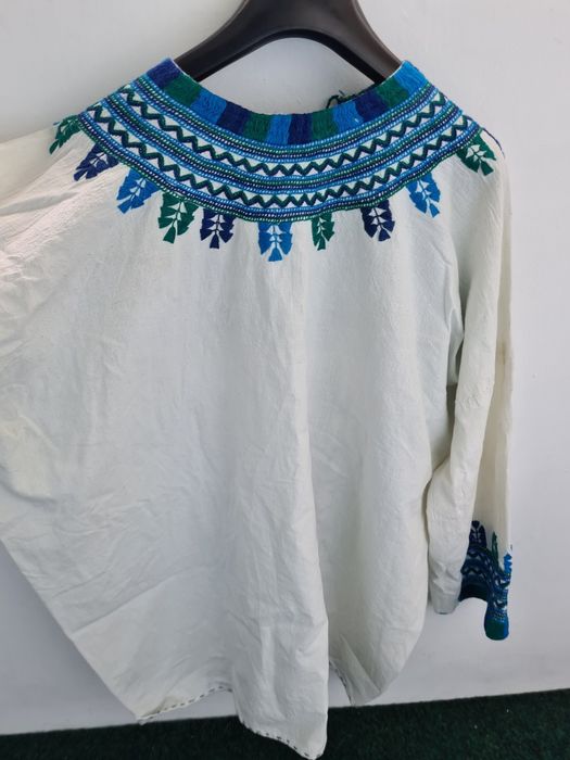 Ie cusuta manual pentru femei