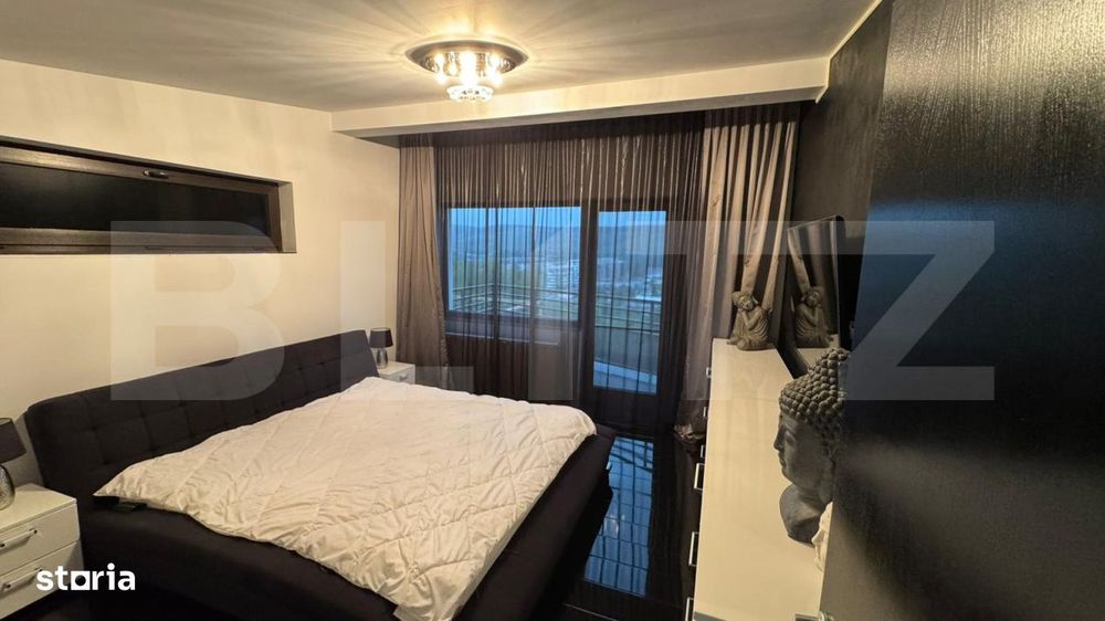 Casa individuala cu 4 camere, 500 mp de teren, garaj de 60 mp, zona Vi