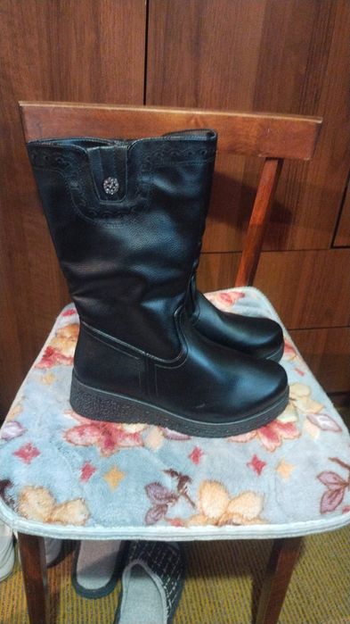 Женские сапоги..