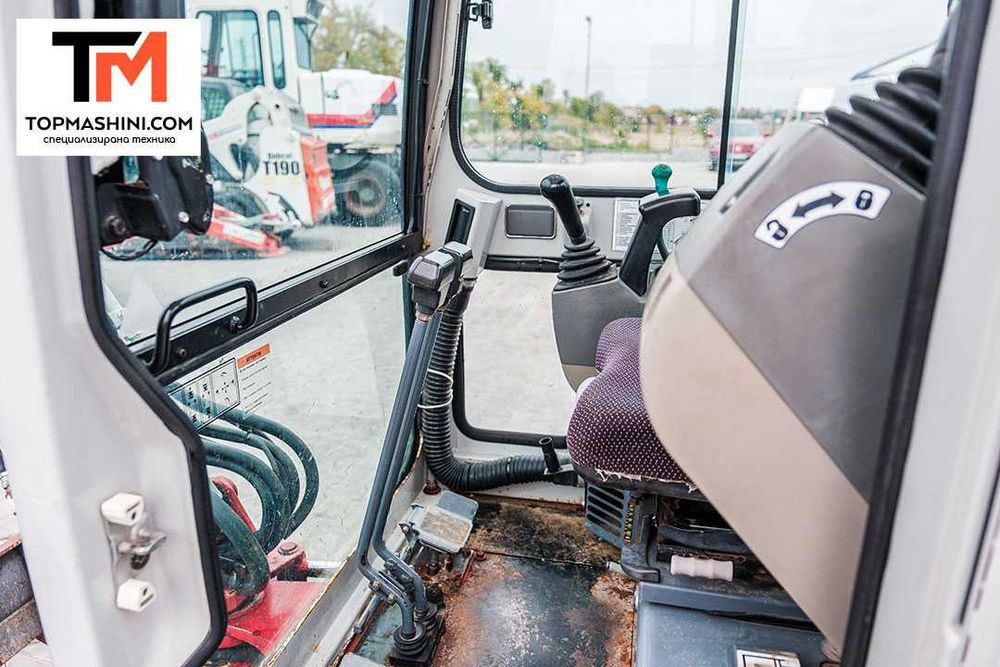 Мини багер Takeuchi TB016