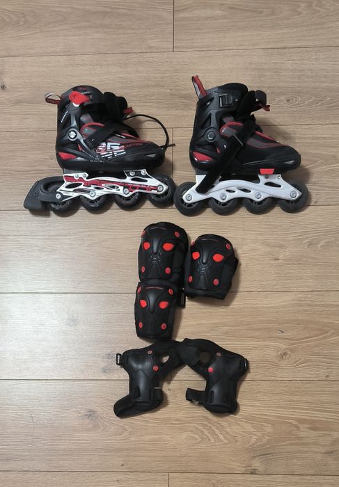 Роликовые коньки