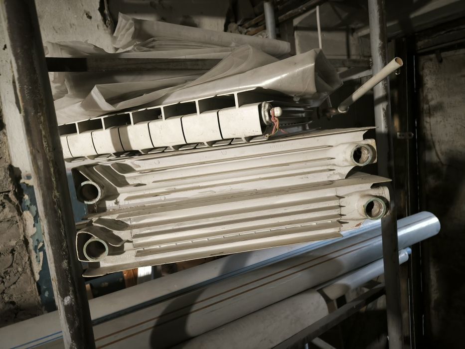 Продам батареи  чугунные