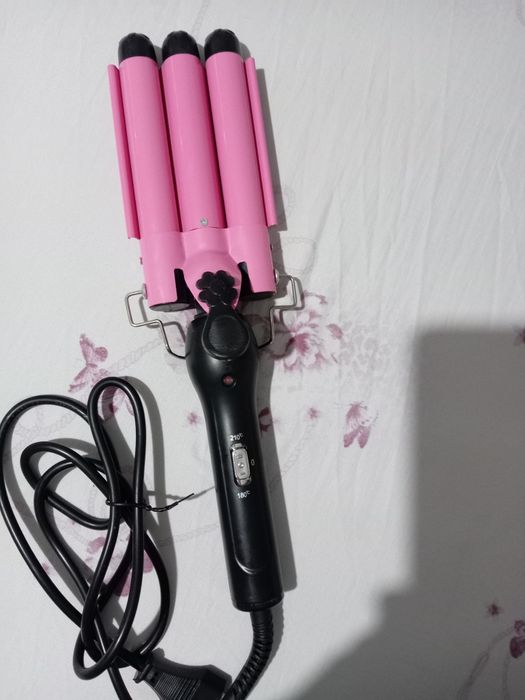 Vând placa pentru bucle e noua