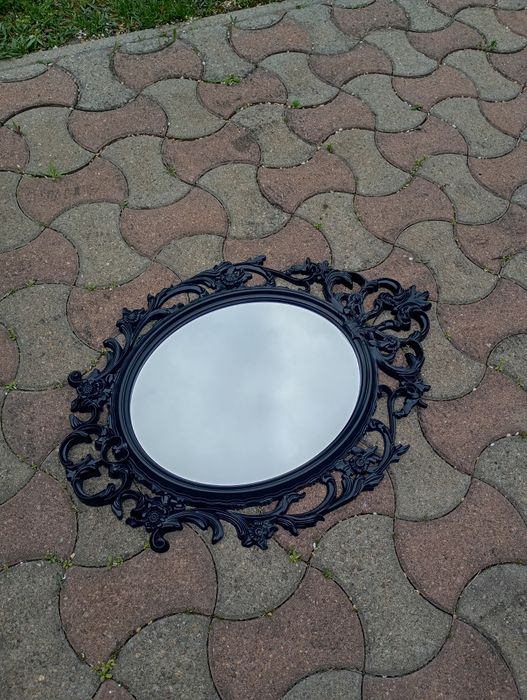 Oglindă ovala cu rama neagra