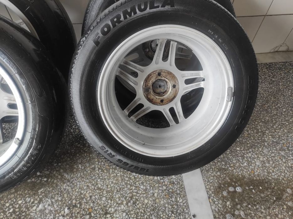 Продам титановые диски с резиной