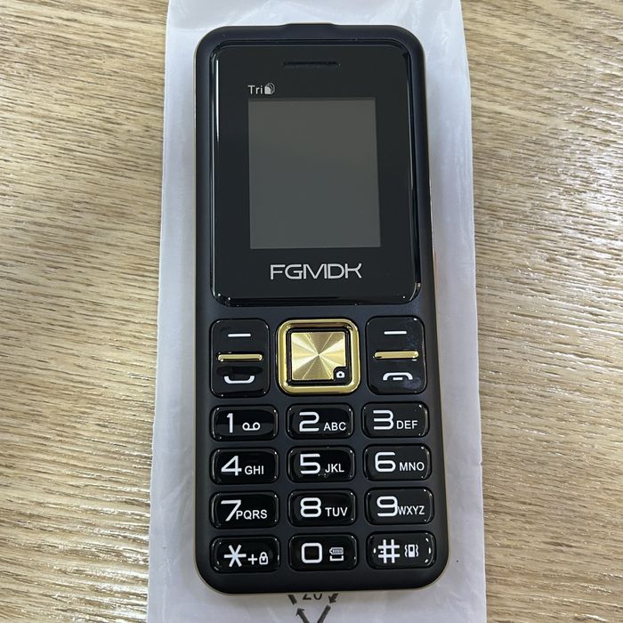 Кнопочный телефон