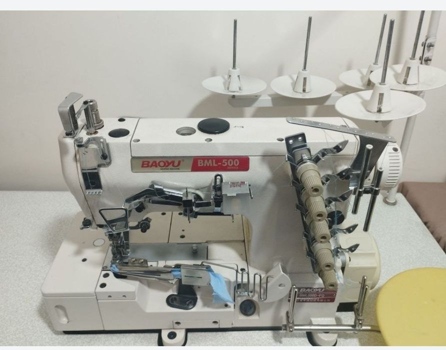 Швейный машинка и овеловки