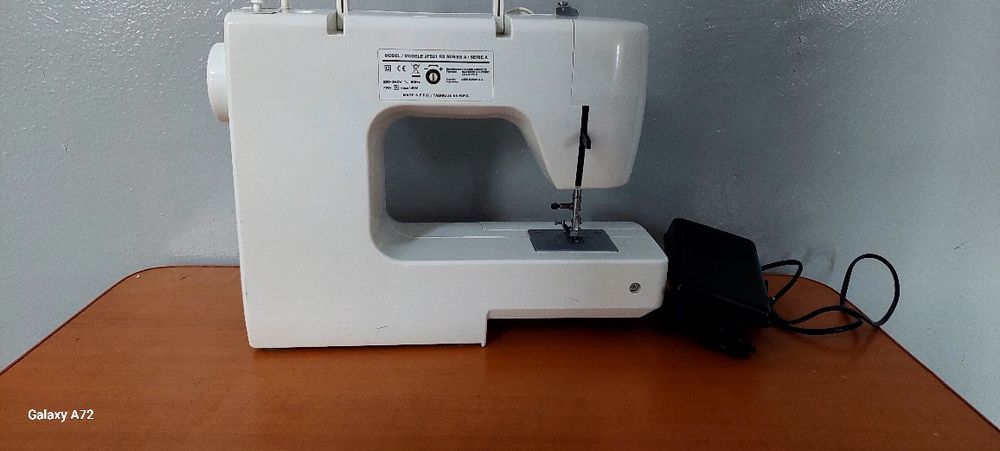 Masina cusut singer tradition,  veritas.