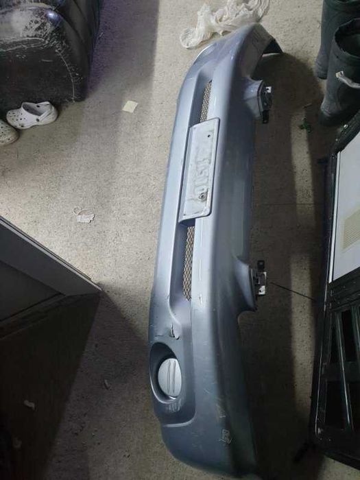 Бампер передний Mitsubishi Pajero iO 2004