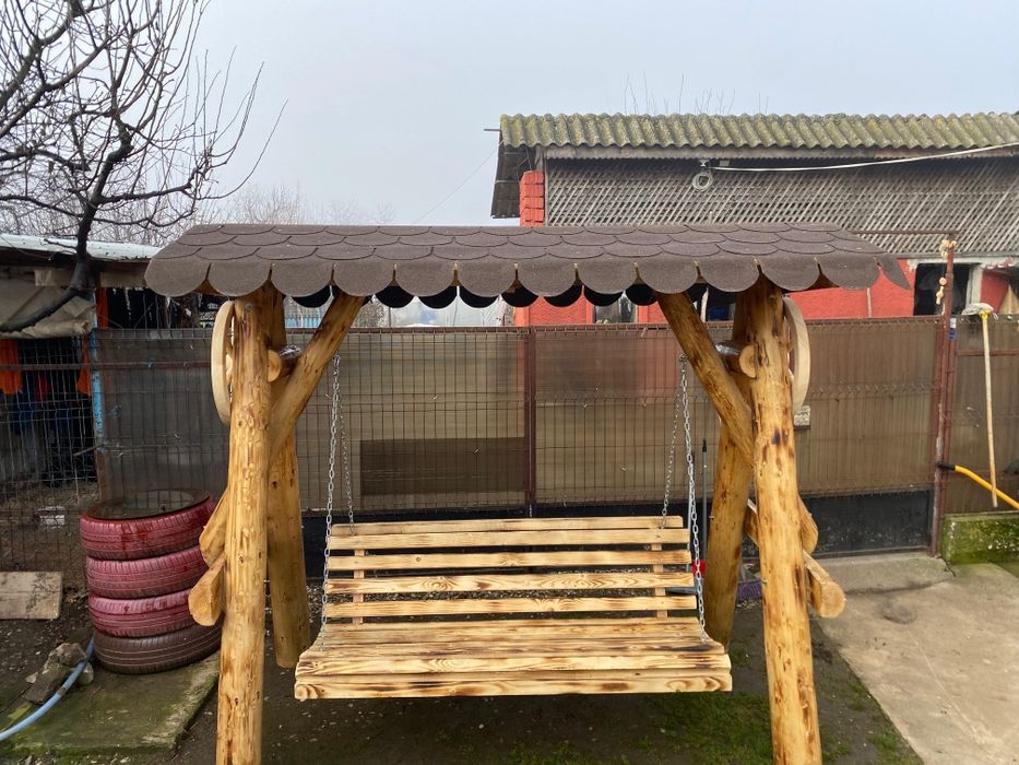Balansoar  rustic  din  lemn  masiv  bușteni  cu 2 leagăne