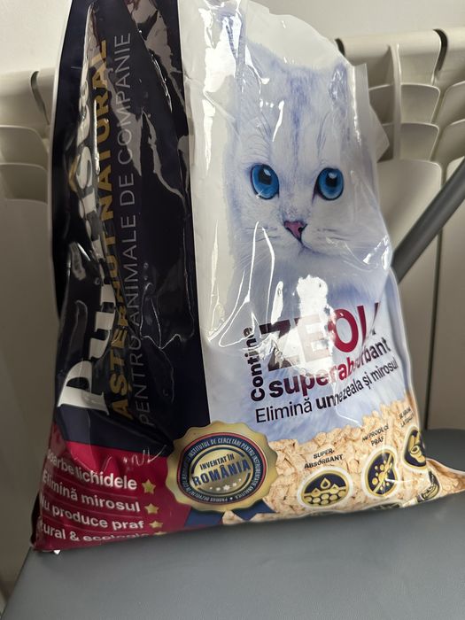 Cusca pisica, un sac de asternut paleti si doua de nisip