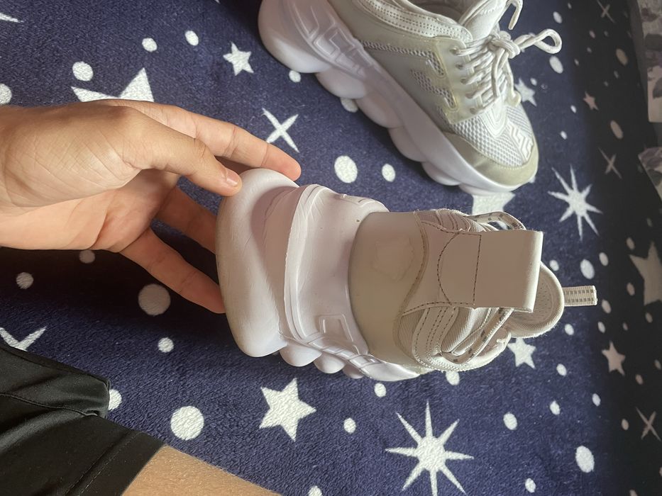 Versace chain reaction