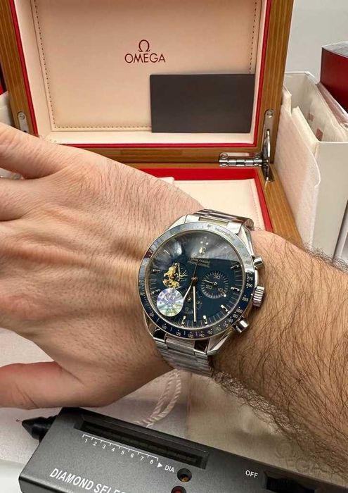 omega speedmaster среброC