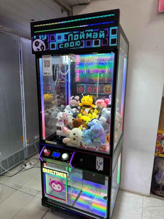 Игрушка аппарат хватайка