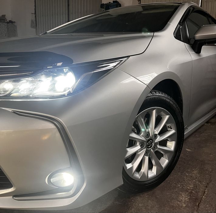 Tayota Corolla E210