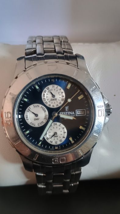 Vând ceas bărbătesc Festina ,cadran albastru,secundar și cronometru