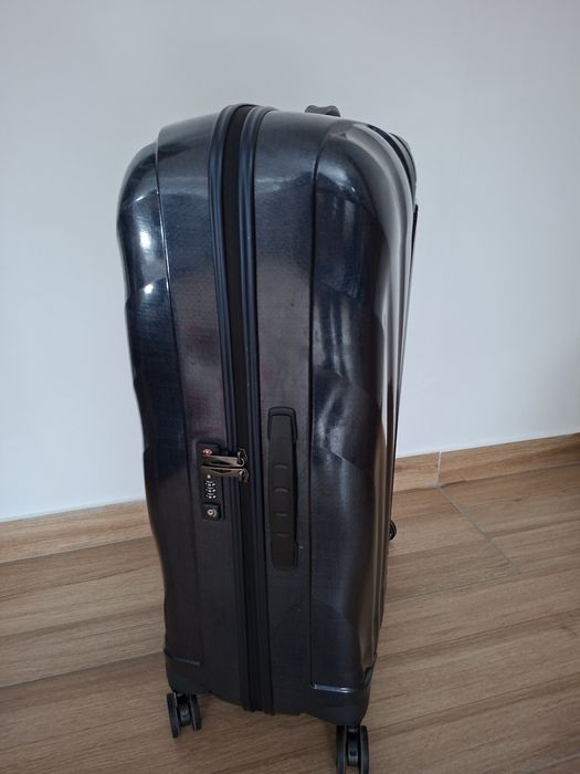 Vând troler Samsonite, nou.