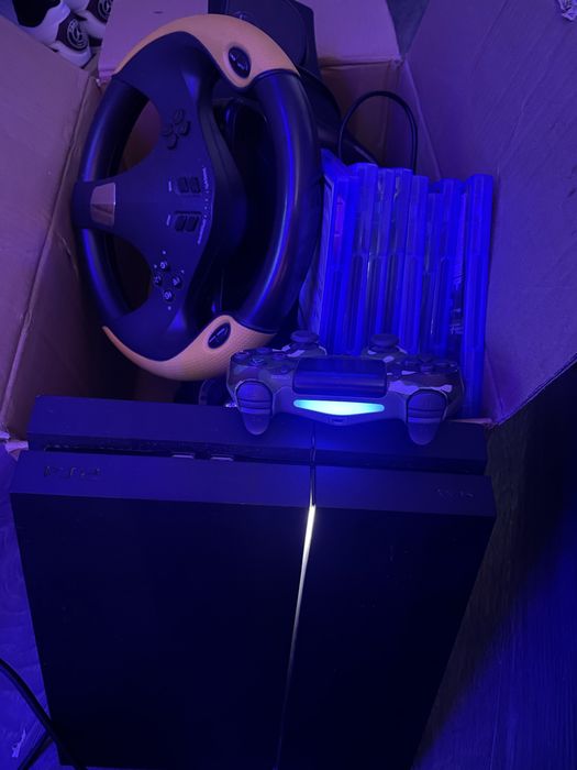 Ps4 ,volan de gaming +8 jocuri