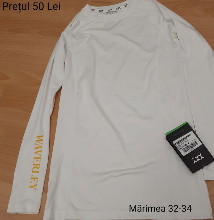 Tricou alb nou încă în garanţie