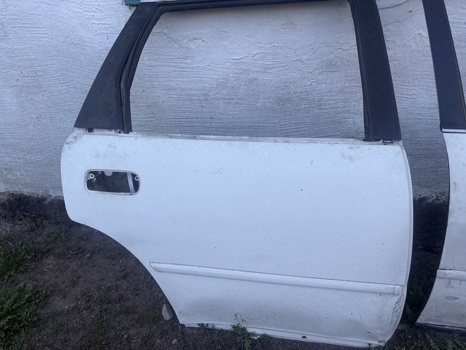 Дверь на камри 10