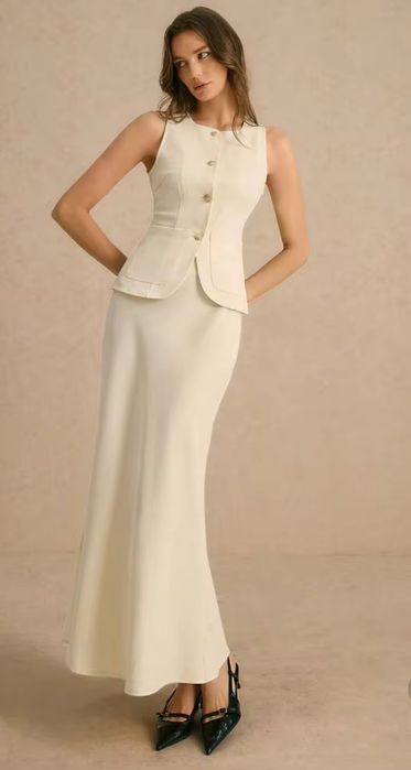 Costum fusta vesta