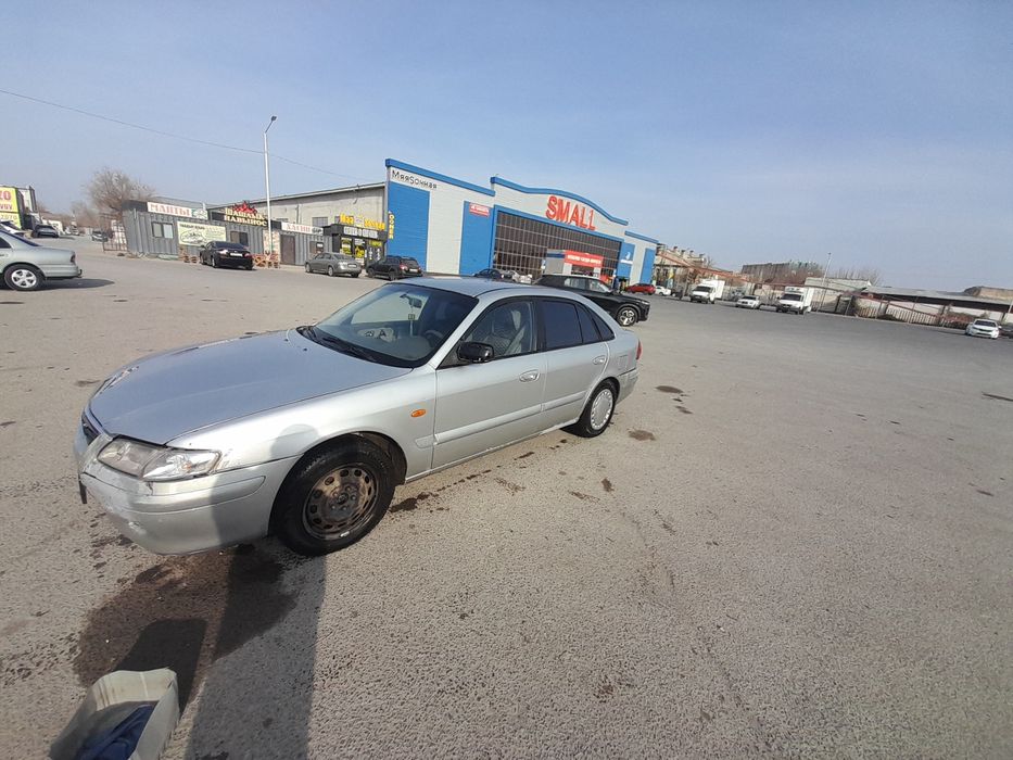 Мазда 626 птичка