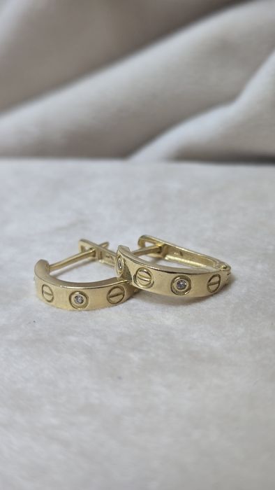 Серьги золотые по 44000 за грамм