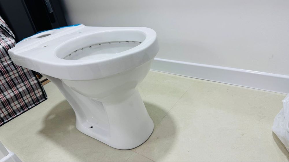 Новый унитаз не использованный