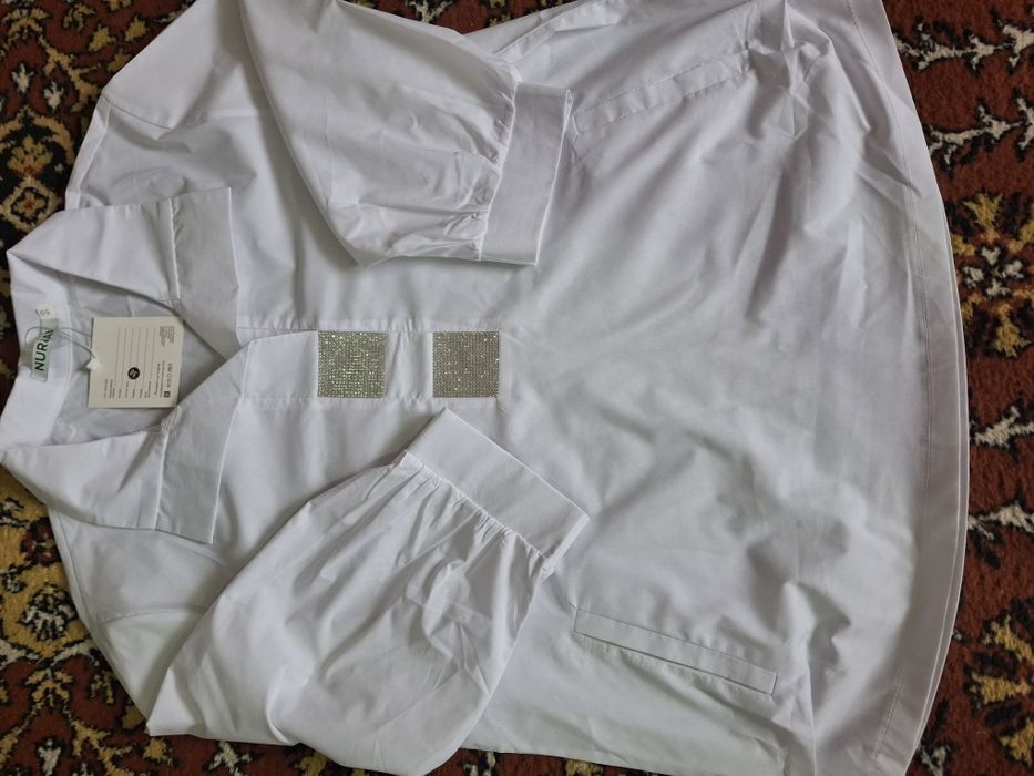 Брючный костюм .