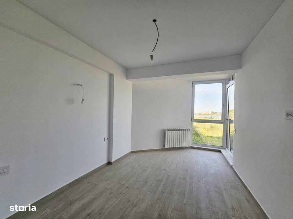 Apartament cu vedere catre lac in complex cu piscina privata si sala d