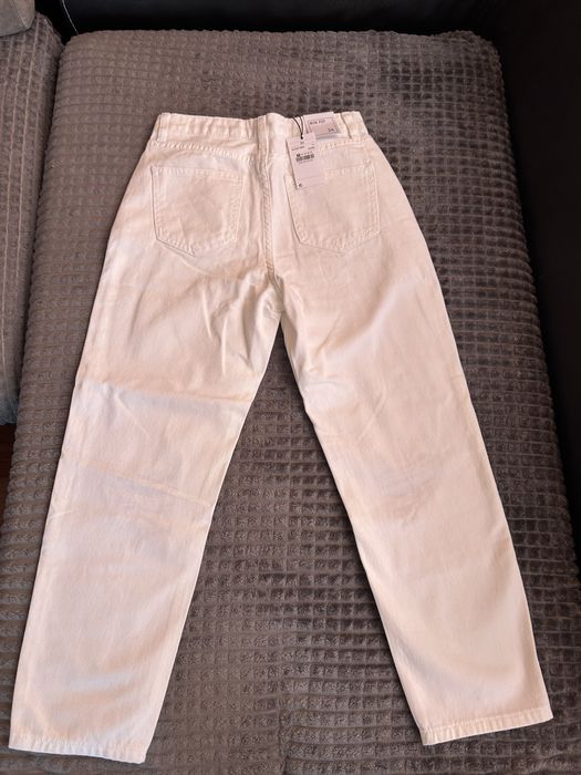 Бели дамски дънки размер 34