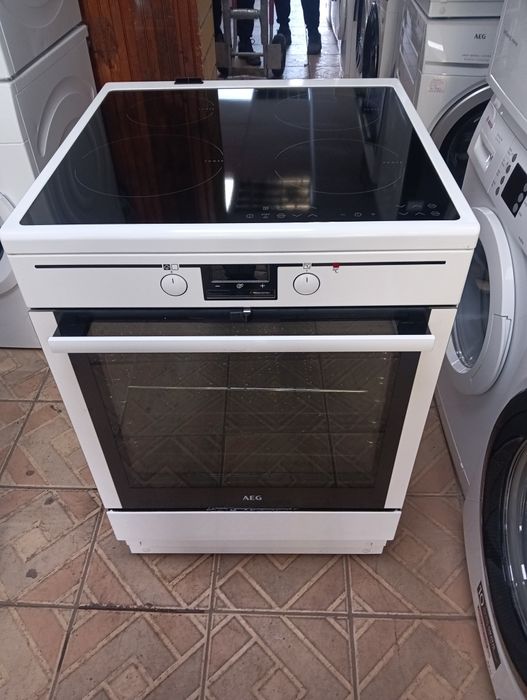 Свободно стояща печка с индукционни котлони Аег Aeg 2 години Гаранция!
