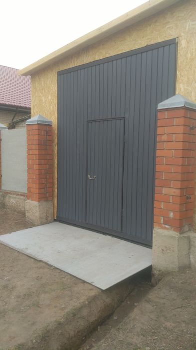 Изготовление откатных ворот и деревянных конструкций под ключ