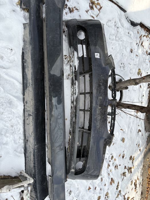 Продам. Комплект два бампера и проги BMW e 60