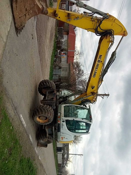 Vand/schimb Excavator New Holand MH City 16t