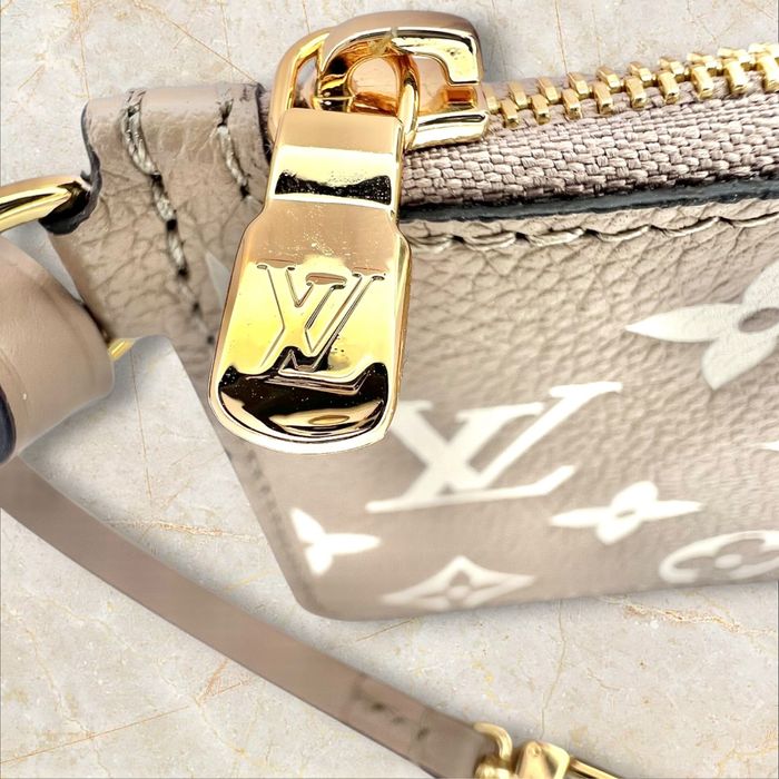 Louis Vuitton портмоне за стотинки от чанта