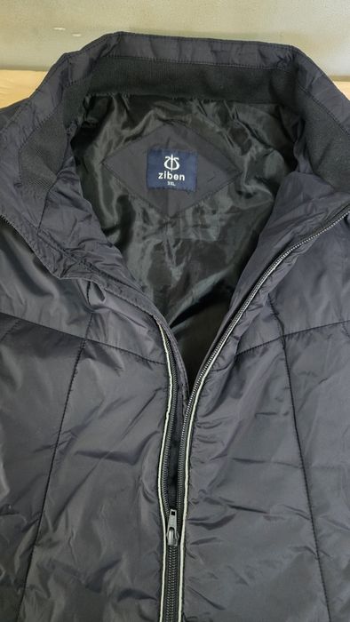 Продам фирменную жилетку