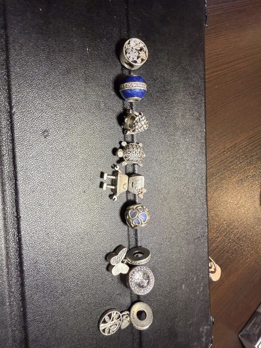 Гривна и талисмани Pandora