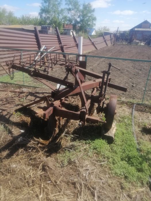 Плуг двухкорпусной