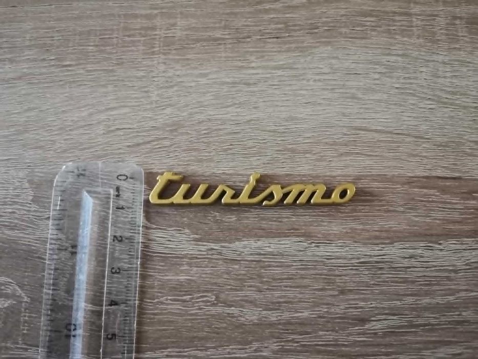 златиста емблема Tursimo за ABARTH
