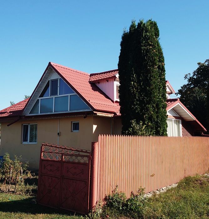 Casa și teren cu livada