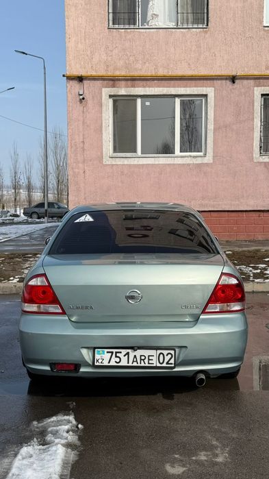 Машина ниссан алмера класик