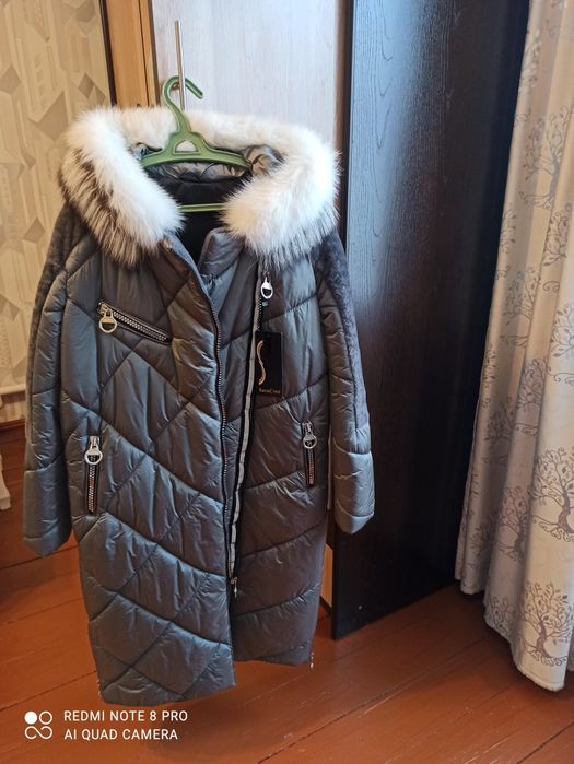 Продам новый пуховик -дубленку.Турция