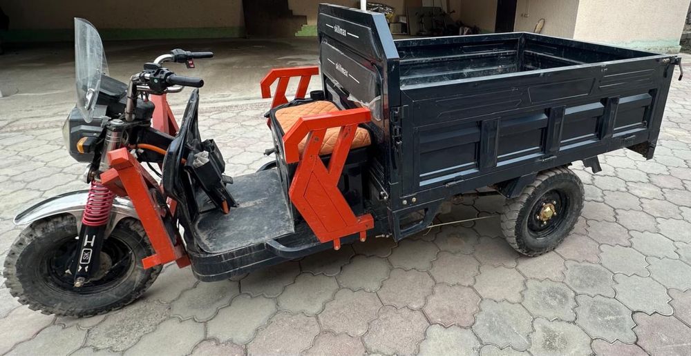 Электрический трицикл