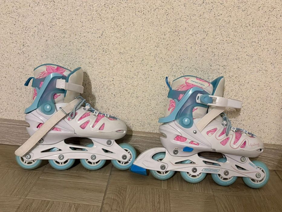 Роликовые коньки