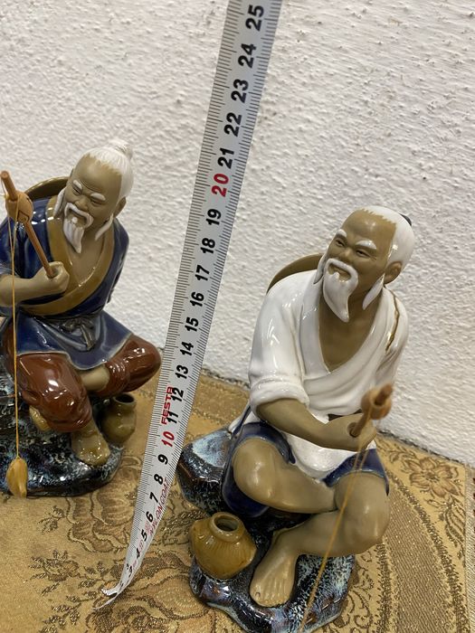 Стари азиятски фигури рибари