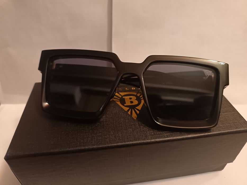 Дизайнерски слънчеви очила